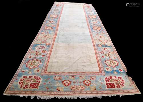 A fine and large antique rug or carpet, possibly Ziegler, 886cm x 348cm.