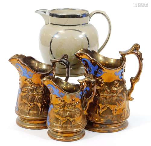 A set of three graduated Victorian copper lustre pottery jugs, moulded with dasies and blue spring