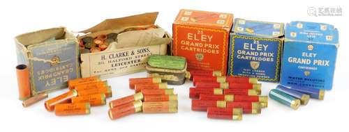 A collection of vintage 12 bore shotgun cartridges, including Purdey's Special, Eley Grand Prix,