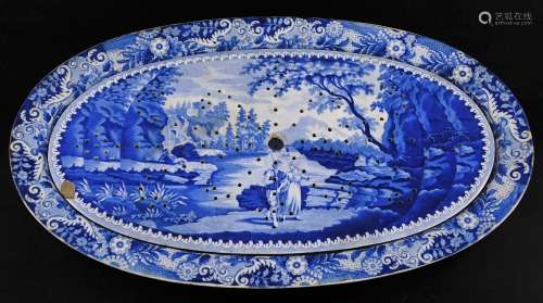A 19thC blue and white Brameld pearlware pottery meat platter and drainer, of oval form set with