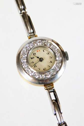 A 1920's/30's diamond set cocktail watch, on a later bracelet, the watch head with small cream