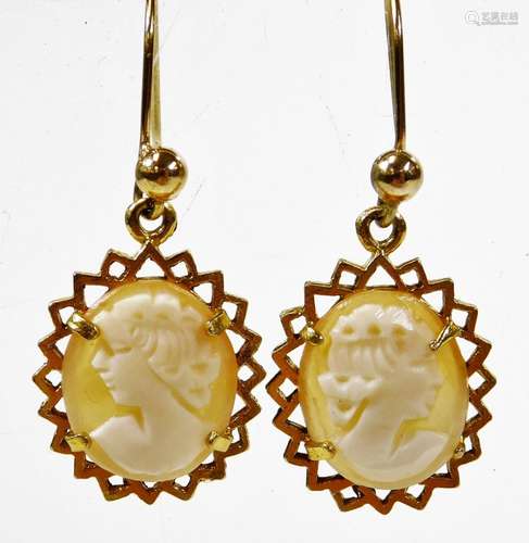 A pair of 9ct gold cameo earrings, with oval cameo panel in star framed border, 2.6g all in.