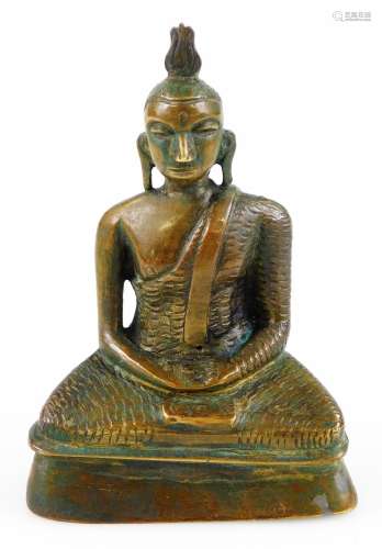 A Sri Lankan bronze of Kandlin Buddha, in seated pose, partially textured, unsigned, 9cm high.