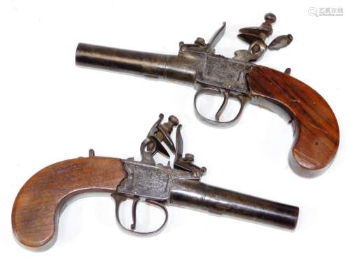 A pair of early 19thC Lincolnshire flint box lock muff pistols, stamped Edgson, Stamford, 18cm. (AF)