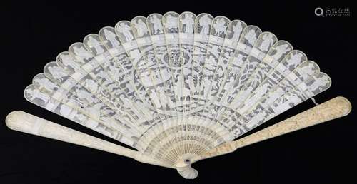 A 19thC Canton Chinese ivory fan, the guards carved with figures and flowers, the sticks with fine