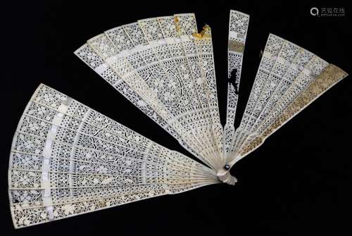 A 19thC Chinese fan, with Canton carved and pierced bone sticks, 18cm. (AF)