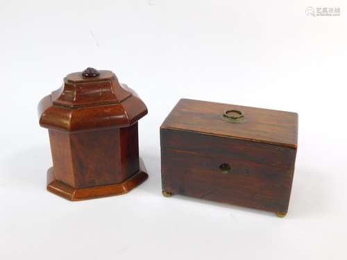 An early 19thC rosewood tea caddy, raised on four brass ball feet, 10cm H. 16cm W, 9.5cm D.,