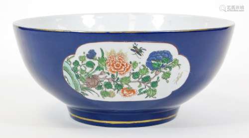A large Chinese porcelain punch bowl, with powder blue ground with gilt bands, the main body