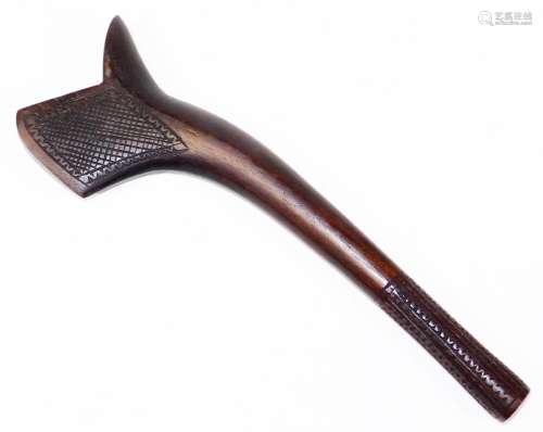 A 19thC Polynesian throwing club, with turned carved handle and naive carved and reduced end, with a