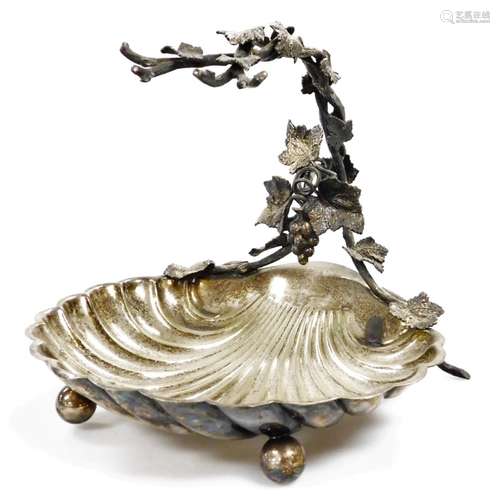 An Edwardian electroplate fruit stand, with shell shape bowl and bacchanalian handle, 23cm high,