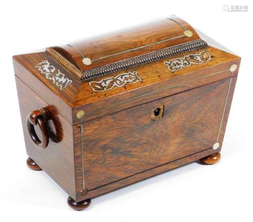 A Regency rosewood sarcophagus tea caddy, with mother of pearl inlay, ring handles and original