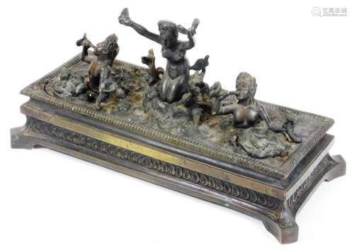 After the Antique. An early 19thC Grand Tour bronze inkstand, having a central figure of a sea