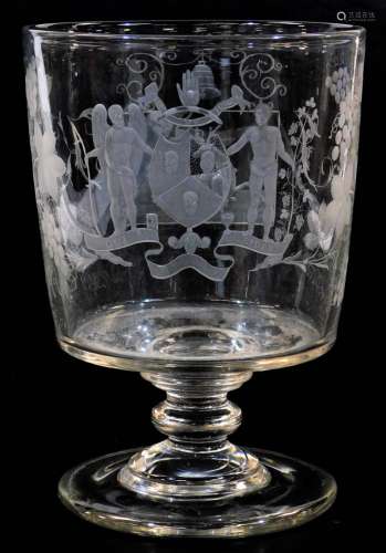 A early 19thC etched Masonic oversized glass goblet, with bell shaped bowl, profusely decorated with