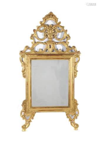 An Italian giltwood and composition wall mirror