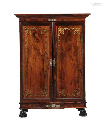 A George IV rosewood and brass inlaid cupboard or dwarf linen press