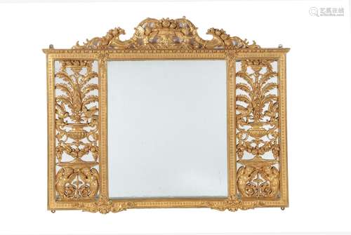 A Continental carved giltwood wall mirror in the German Baroque manner