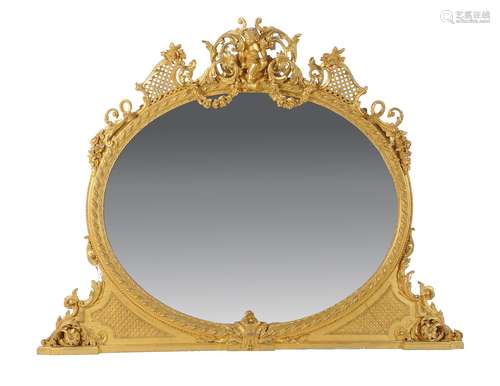 A late Victorian carved giltwood and composition overmantel mirror