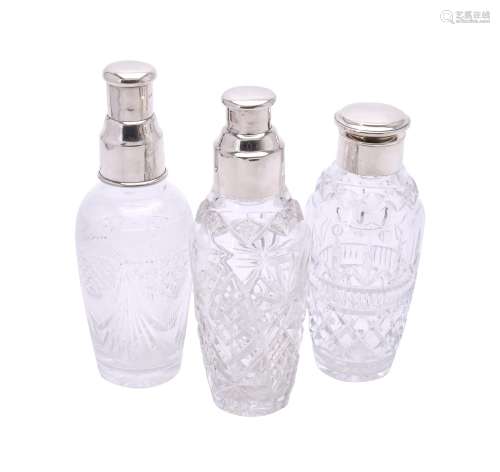 Three silver mounted cut glass cocktail shakers