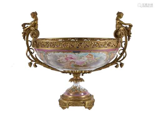 A French Sevres-style porcelain and gilt bronze mounted twin-handled pedestal centrepiece