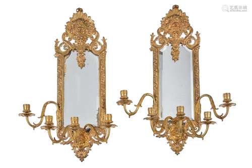 A pair of French gilt metal five light girandoles