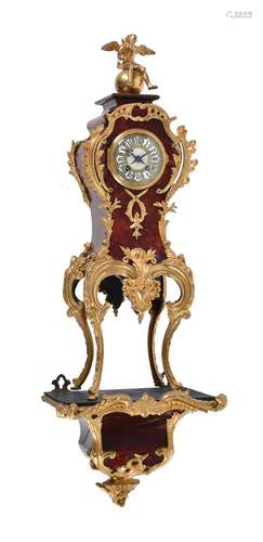 A French gilt metal and scarlet tortoiseshell mantel clock in Rococo style