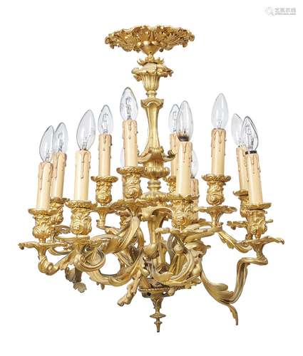 A French gilt bronze twelve light chandelier in Louis XV style