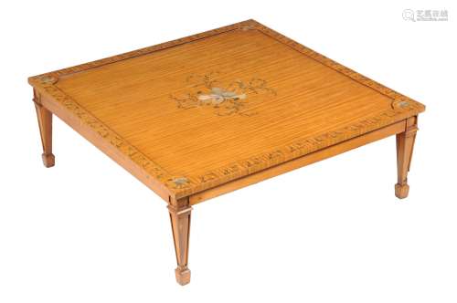 A satinwood low occasional table in Edwardian style