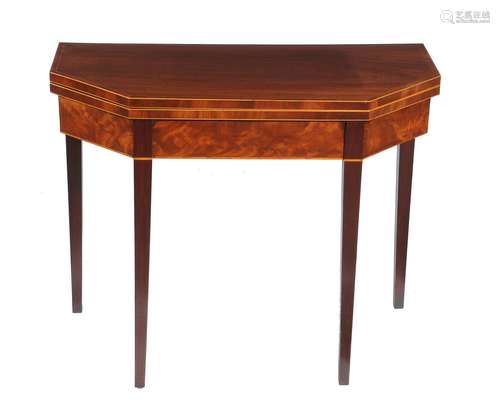 A George III mahogany and boxwood strung card table