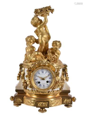 A late 19th century ormolu and white marble mantel clock