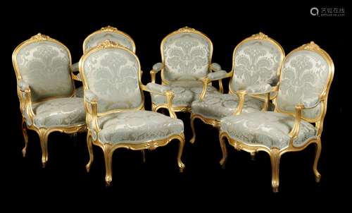 A set of six carved giltwood and upholstered fauteuils in Louis XV style