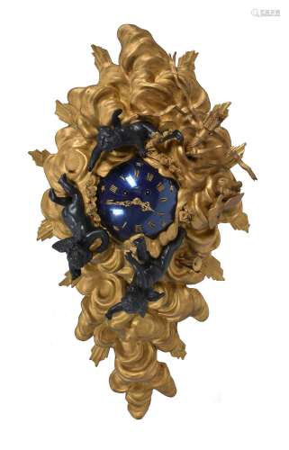 An unusual Empire style gilt and patinated bronze cartel clock