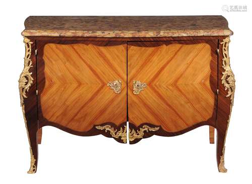 A rosewood, kingwood, and gilt metal mounted commode in Louis XV style stamped 'Daide F'