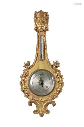 A Victorian carved giltwood and gesso wheel barometer