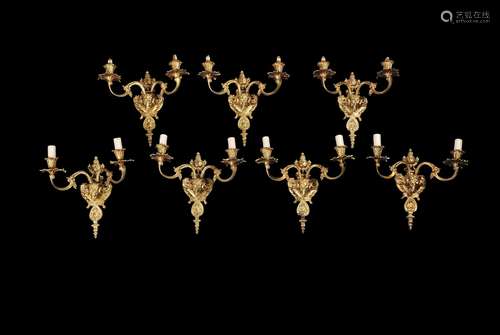 A set of seven French gilt bronze wall appliques in Louis XVI style