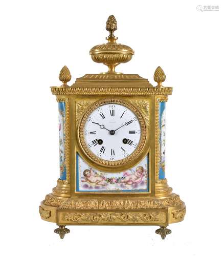 A French Sevres style porcelain and gilt metal mounted mantel clock