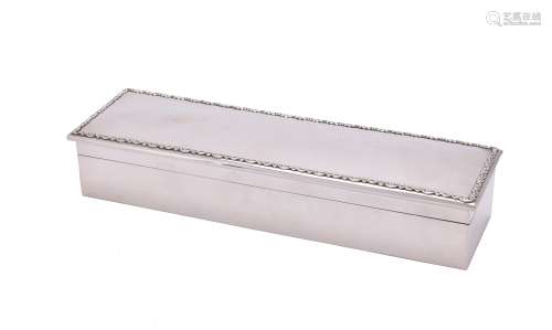 An Edwardian silver long rectangular glove or trinket box by Mappin & Webb
