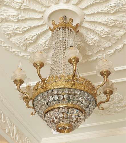 A gilt metal and glass eight light chandelier