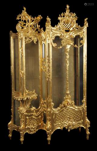 A carved giltwood vitrine