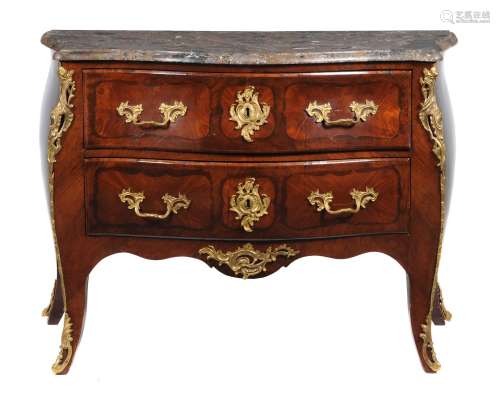 A French kingwood, gilt metal mounted, and marble topped commode