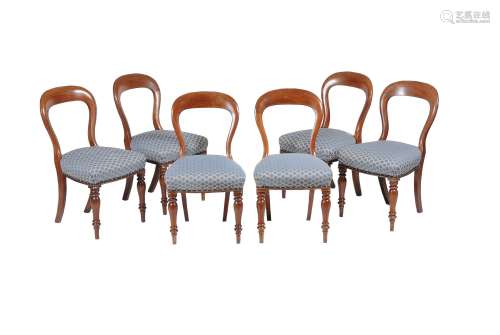 A set of twelve Victorian mahogany dining chairs