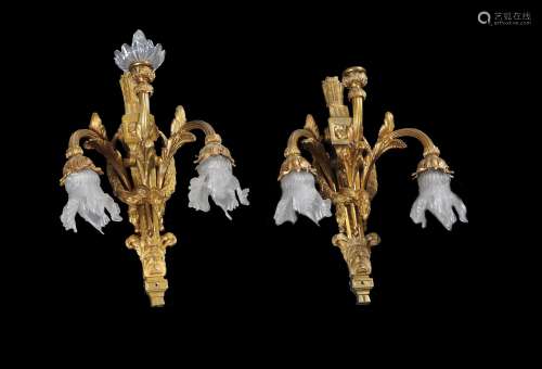A pair of French gilt brass three light wall brackets in 18th century style