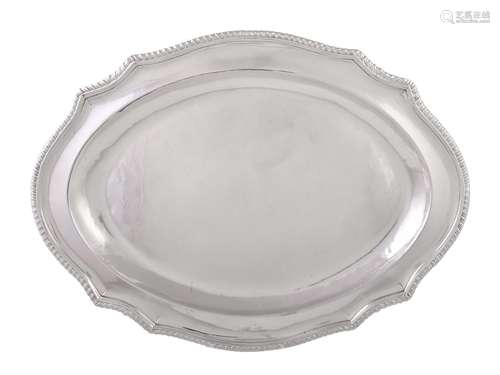 A George III silver shaped oval meat dish by John Mewburn