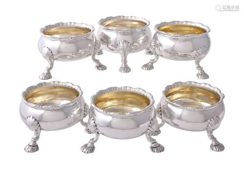 A matched set of six late George II silver cauldron salt cellars