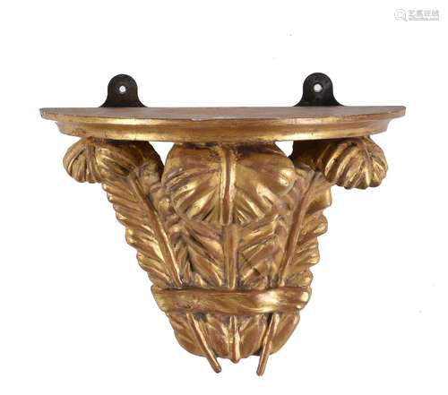 A carved giltwood wall bracket