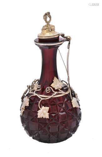 A late Victorian silver gilt mounted ruby glass claret jug by Elkington & Co.