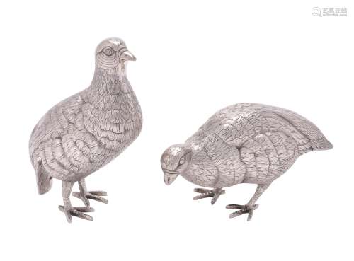 A pair of Italian silver coloured models of partridges
