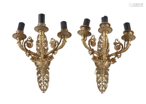 A pair of Charles X gilt bronze three light wall appliques