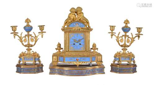 A French Sevres style porcelain and gilt metal mounted clock garniture Japy Frères