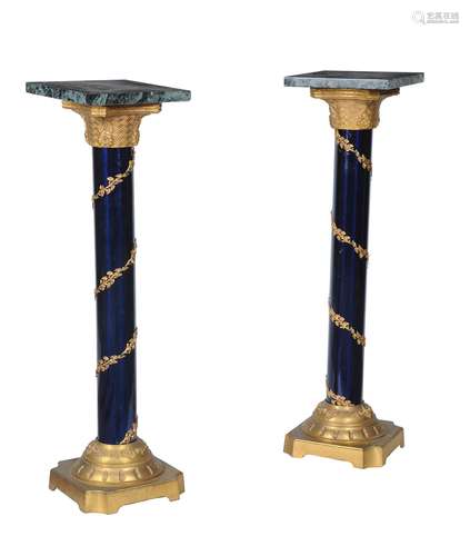 A pair of Empire style marble gilt metal and blue lacquered pedestals