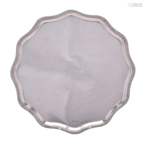 A silver shaped circular salver by Frank Cobb & Co. Ltd